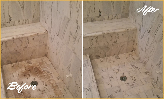Before and After Picture of a Dirty Township of Denville Marble Shower Cleaned to Eliminate Dark Stains